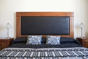 Double bed headboard design with modern cushion and backrest ideas 