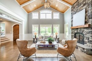 Simple ceiling design for small house with wooden vaulted hall ceiling