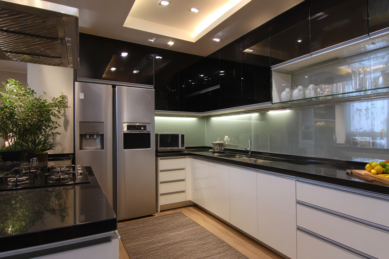 Glossy kitchen false ceiling design with recessed lighting and sleek finishes