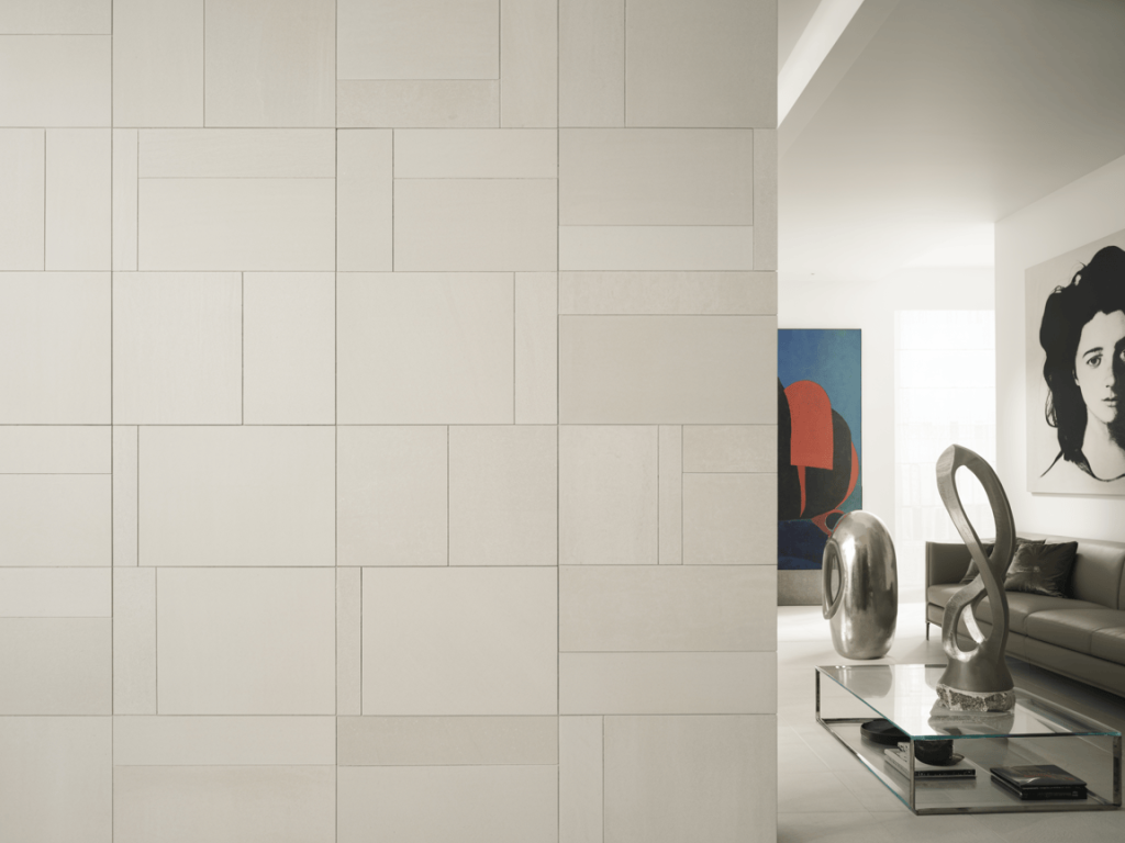 Elegant white wall tiles design for living room with modern artistic touch