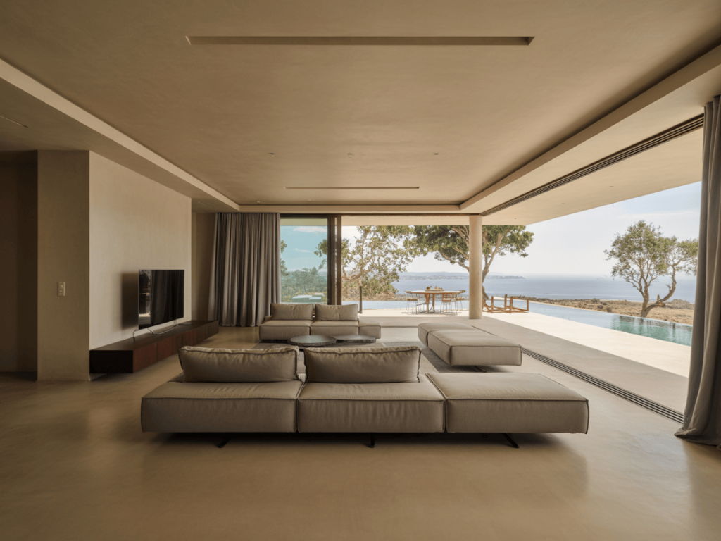 Luxury contemporary living room with ocean view and minimal interior design