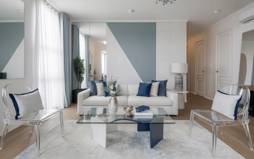 Elegant small living room design with glass decor and minimal furniture layout