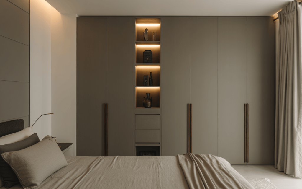 Elegant modern wall almirah design with open shelves and soft lighting in bedroom