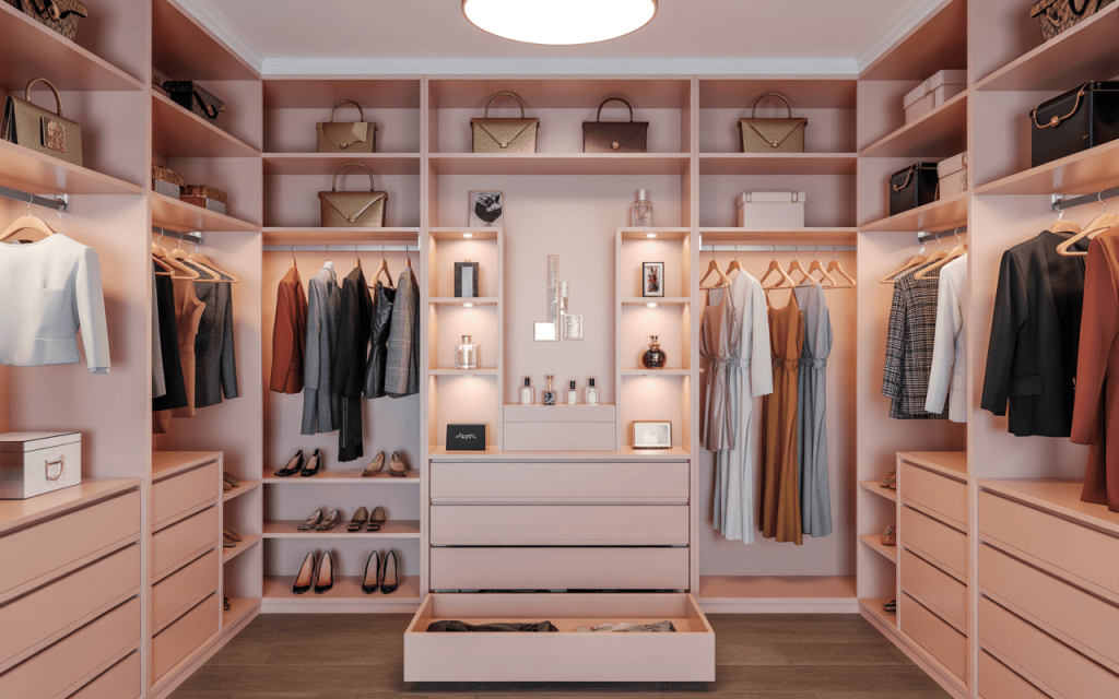 Modern walk in closet wardrobe with blush pink storage and organized fashion display