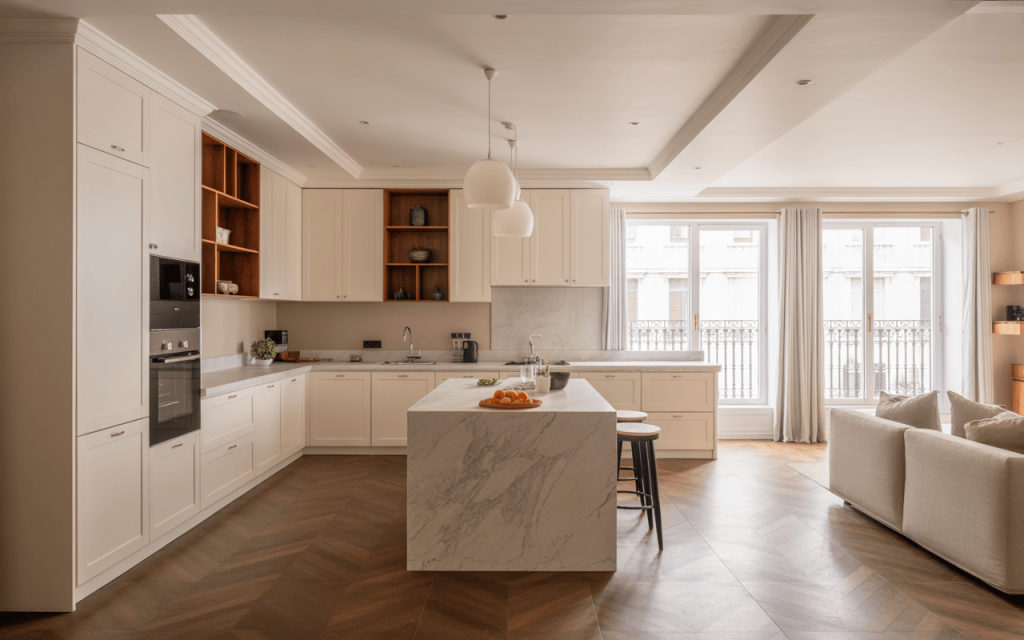 Bright island kitchen architecture design with marble top and open seating layout