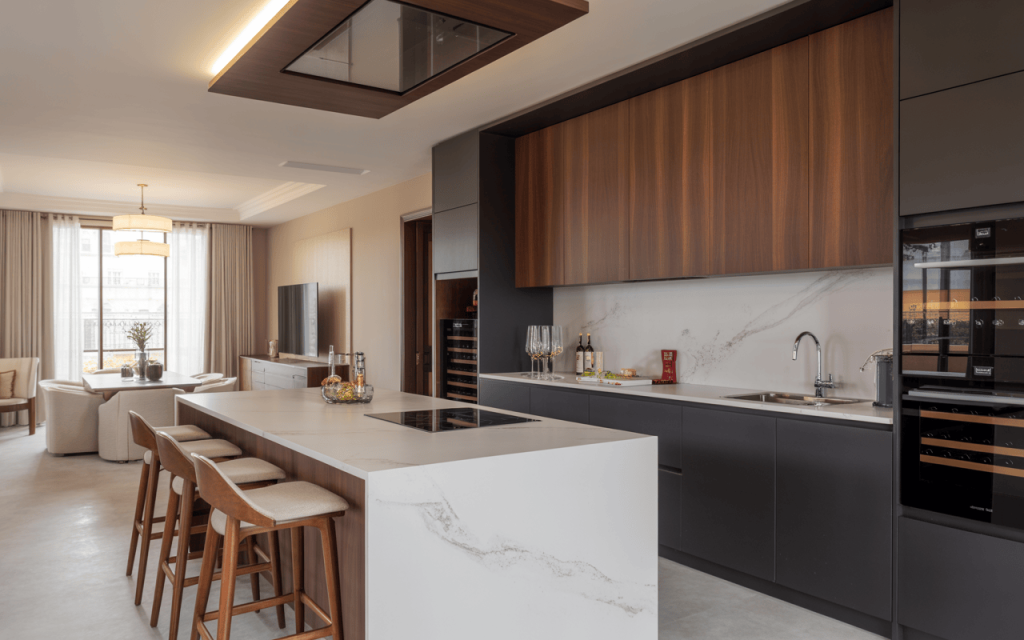 Sleek modern kitchen architecture design with wood accents and marble island counter