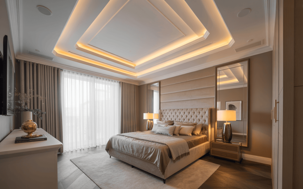 Elegant luxury bedroom ceiling design with layered tray lighting and soft tones
