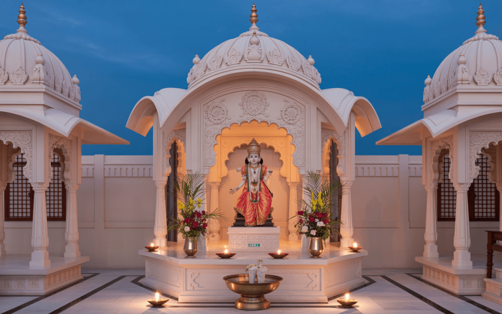Stunning white marble temple design with intricate domes and divine lighting