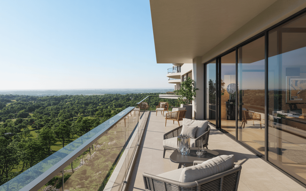 Luxurious glass balcony grill design offering scenic greenery and modern elegance