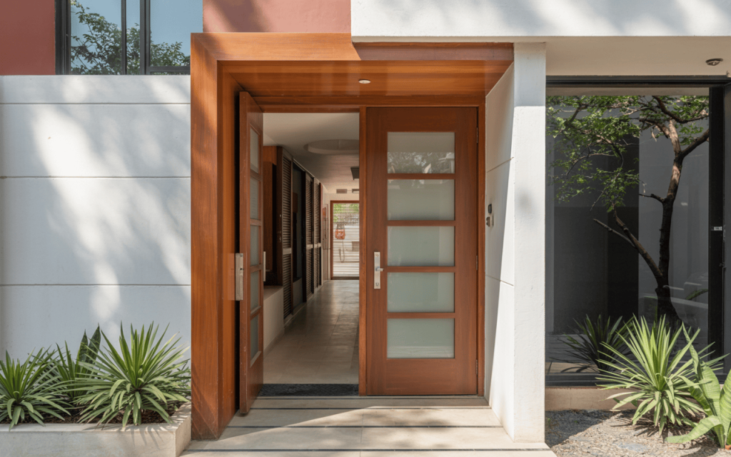 Minimal simple wooden main door design with frosted glass and clean straight lines