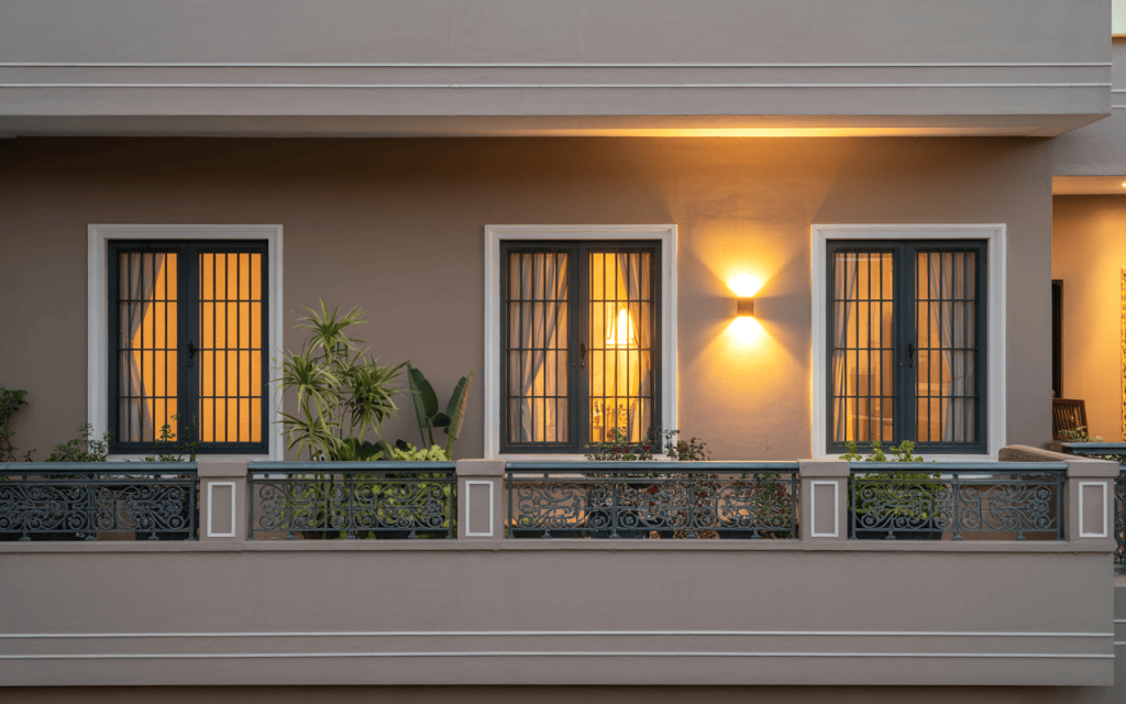 Elegant simple window grill design for indian homes with balcony garden lighting