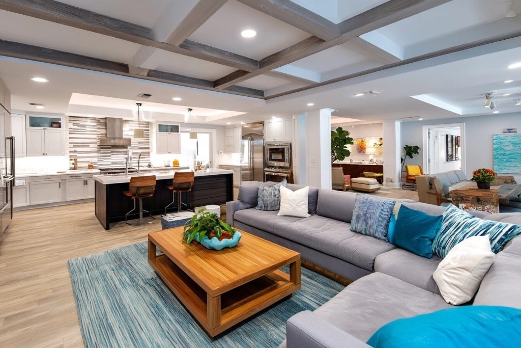 Open-plan modern luxury house design with elegant kitchen and cozy lounge setup