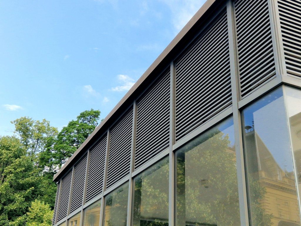 New modern window grill design adding elegance to a contemporary glass building