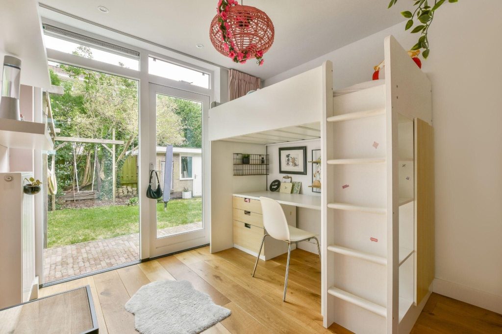 Smart modern box bed design with built-in study desk and minimalist white finish