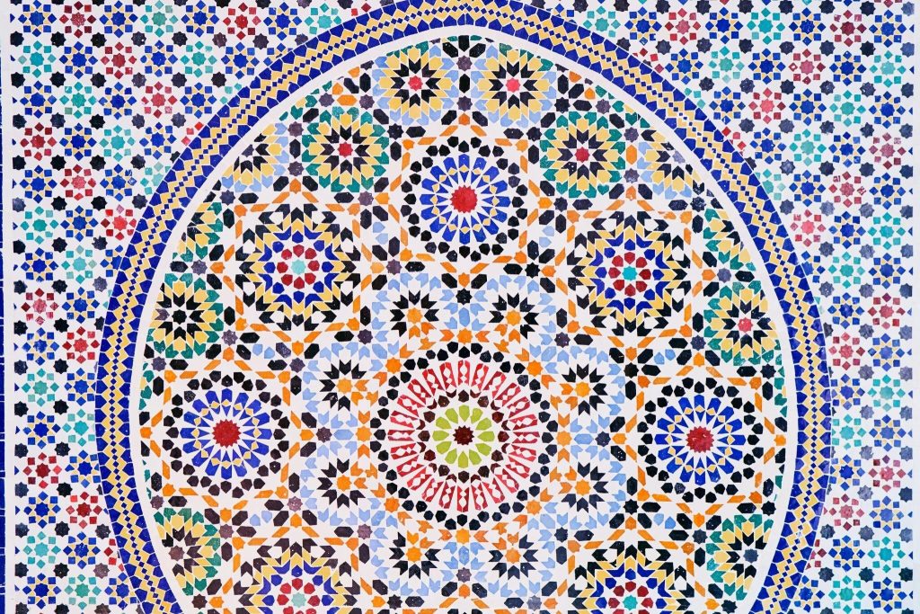 Vibrant bedroom wall tiles design ideas featuring colorful Moroccan mosaic patterns