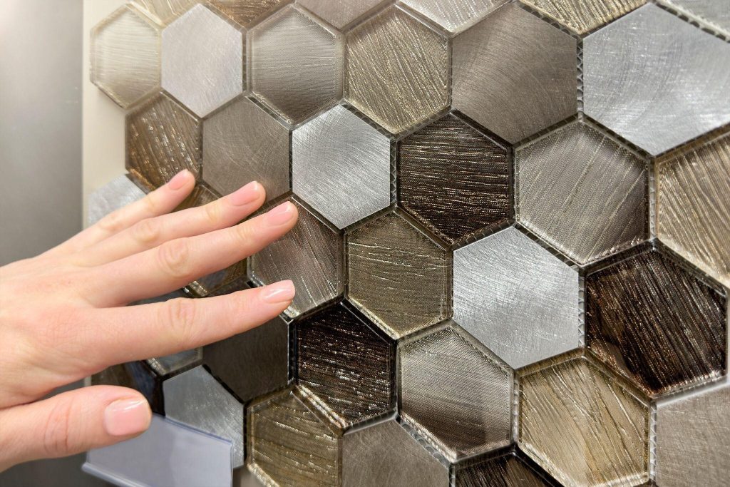 Modern bedroom wall tiles design with metallic hexagon texture for stylish interiors