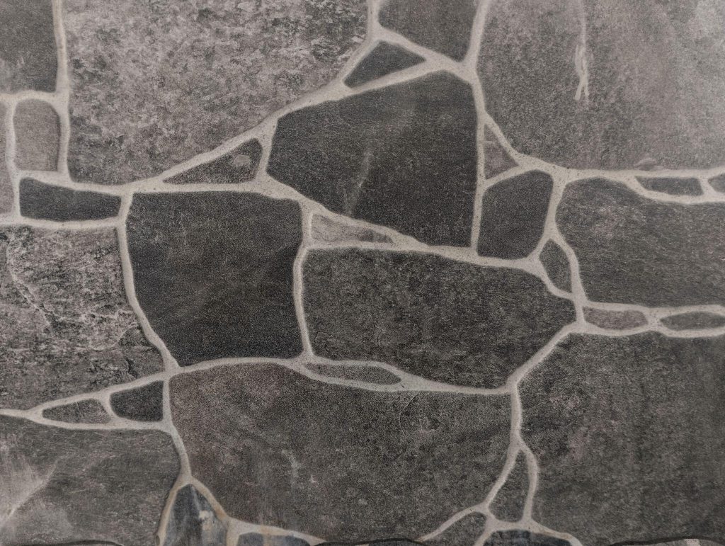 Rustic bedroom wall tiles ideas featuring natural stone texture for a bold modern interior