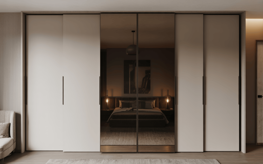 Elegant glass sliding wardrobe design with modern mirror finish and soft lighting