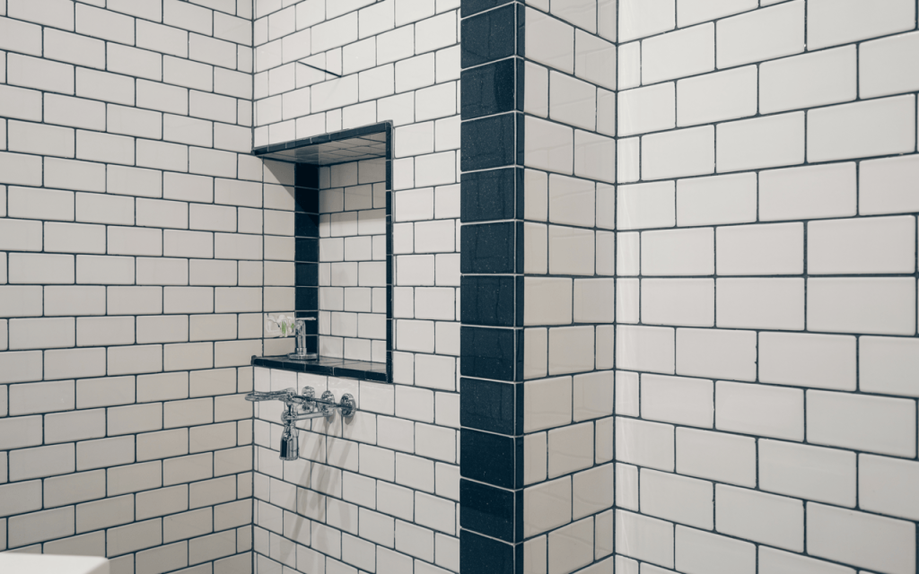 Stylish black and white bathroom wall tiles design with bold contrast and clean finish