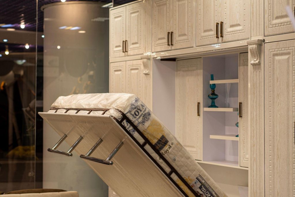 Smart bedroom furniture trends 2026 design with foldable bed and modern storage setup