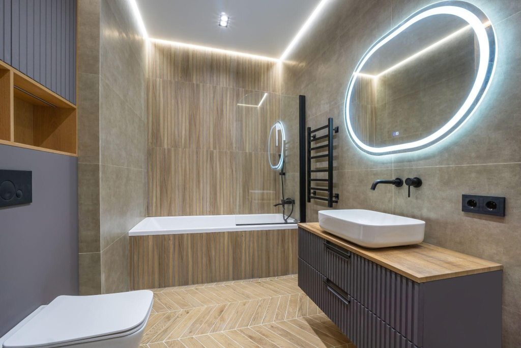 Elegant latest bathroom tile trends featuring wood texture tiles and modern lighting