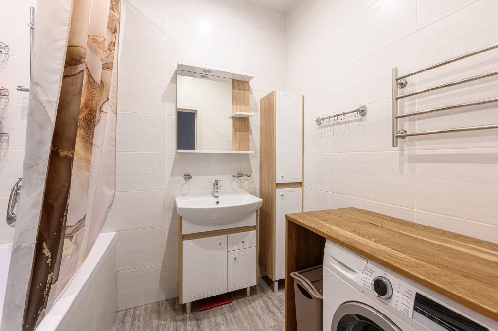 Simple latest trends in bathroom mirrors with compact vanity storage and clean design