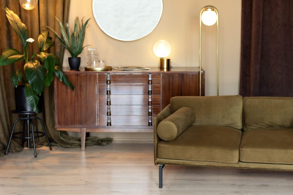 Modern furniture design trends 2026 showcasing sleek wooden cabinet and sofa setup