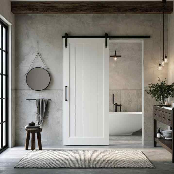 White sliding bathroom door design with black track hardware