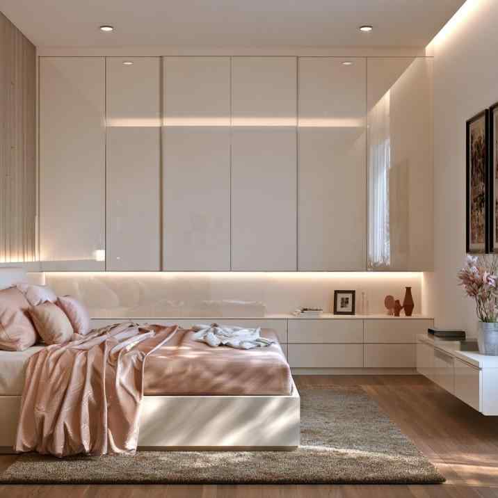 Cream loft storage cabinets above bed with lighting