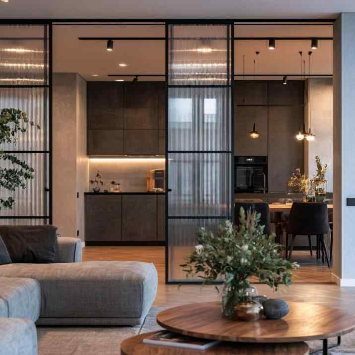 Fluted glass kitchen sliding door with black frame