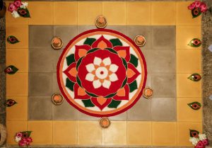 Beautiful Gudi Padwa decoration ideas rangoli with diyas and floral patterns for festive home decor