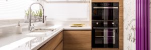 Small kitchen electrical points layout showcasing modern sink area and built-in oven setup with style