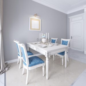 Elegant party ideas for holi dining table setup with white furniture and blue accents