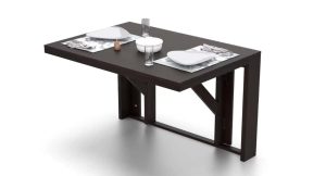 Modern foldable dining table for small spaces with tableware setup