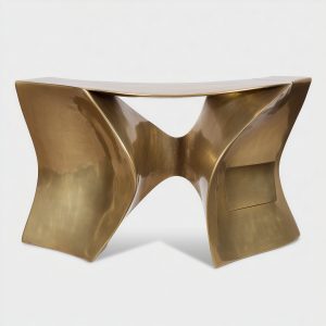 Bold sculptural console vintage home decor ideas with metallic gold statement design