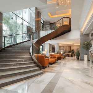 Elegant marble stair designs with curved steps, glass railing, modern lobby, and luxurious interior ambiance