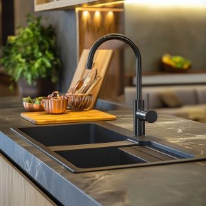 Modern indian kitchen sink design with black granite finish and elegant tall faucet