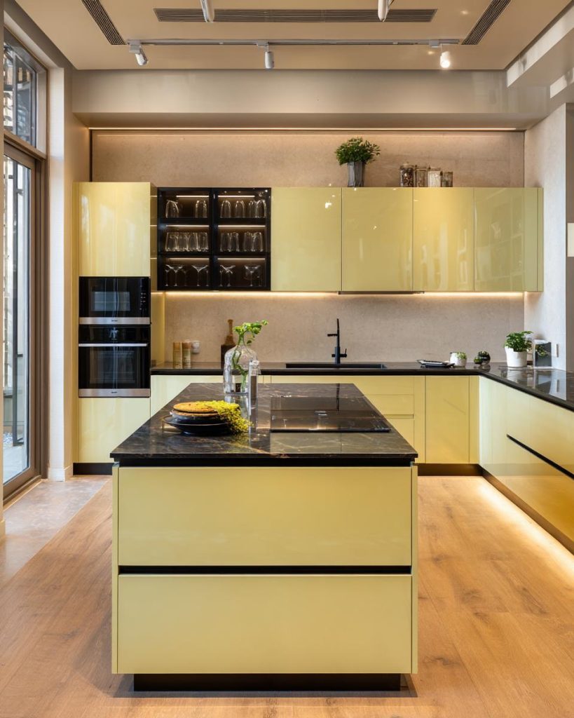 Vibrant yellow aluminium kitchen cabinet cost effective modular layout with a dark island