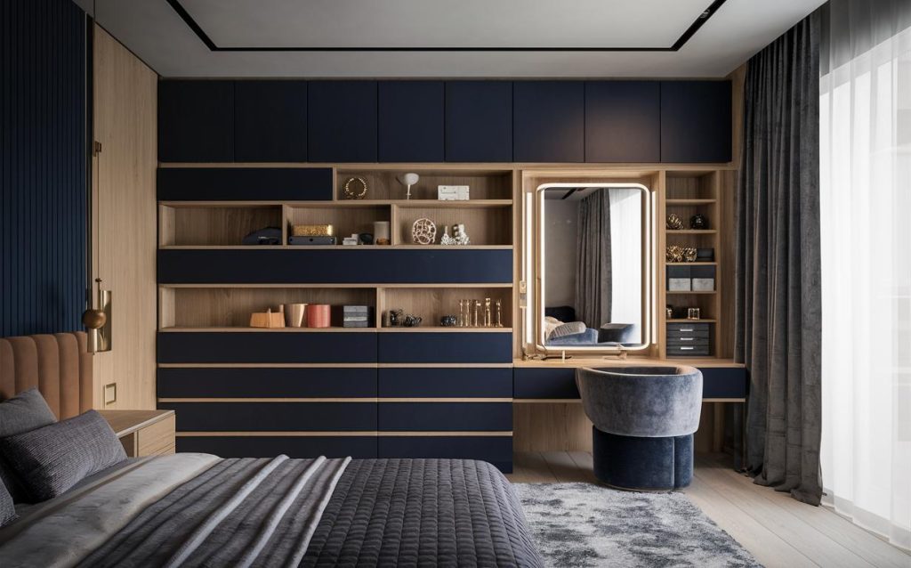Modern cupboard dressing table design featuring blue and wood storage with sleek mirror and stylish vanity