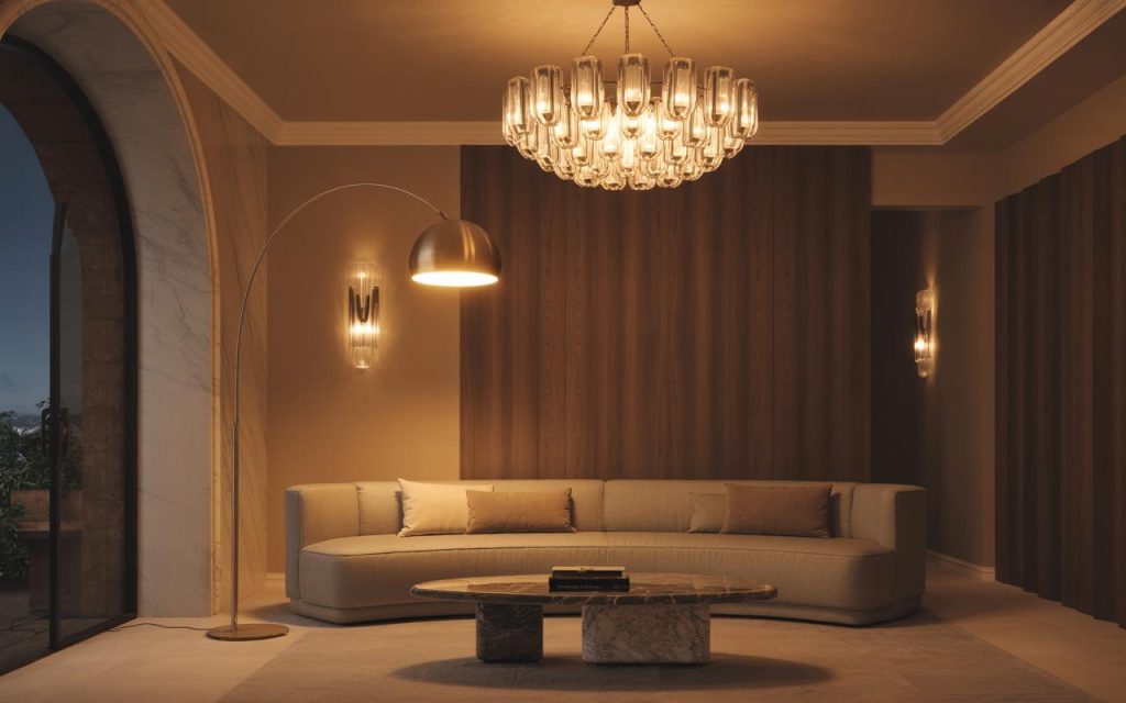 Elegant luxury italian interior design living room with chandelier lighting, curved sofa, and marble coffee table
