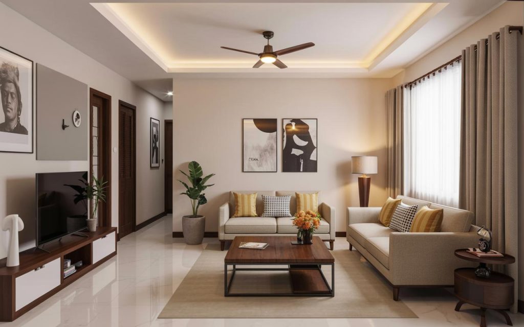 Stylish false ceiling design for living room with cove lighting and fan creating a warm modern space