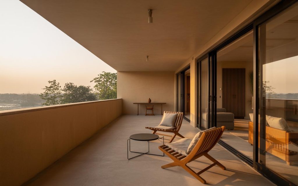 Modern Home vastu balcony with open space, minimal seating and sunlight for balanced energy