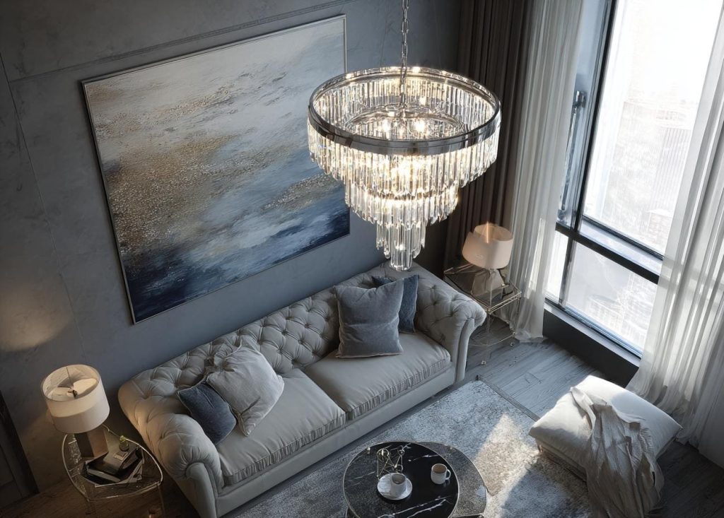 Cascading crystal hanging lights for living room interiors viewed from a high angle.
