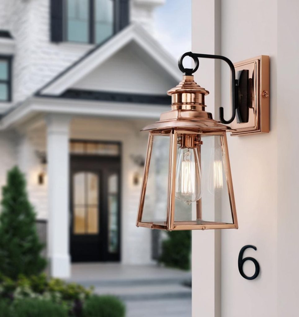  Rose gold wall hanging lights for living room accentuation outside a modern white home.