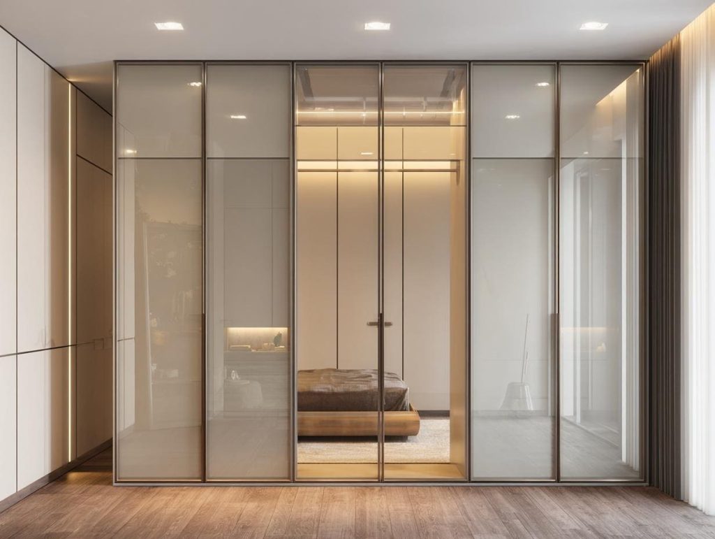 Sleek glass wardrobe door designs for bedroom indian with frosted panels adding elegance and storage