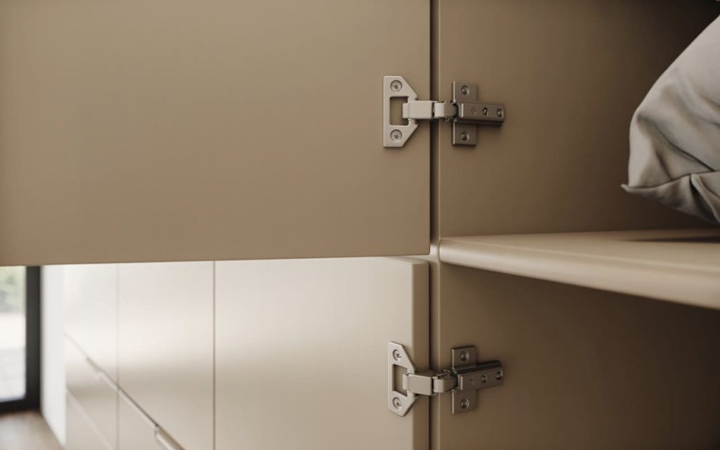 Premium concealed wardrobe hinges fitted inside cabinet for seamless door movement and clean modern finish