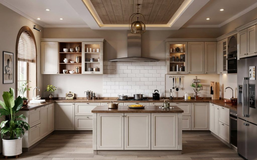 An ornate yet sleek kitchen with gray cabinets with brass hardware and central island unit.