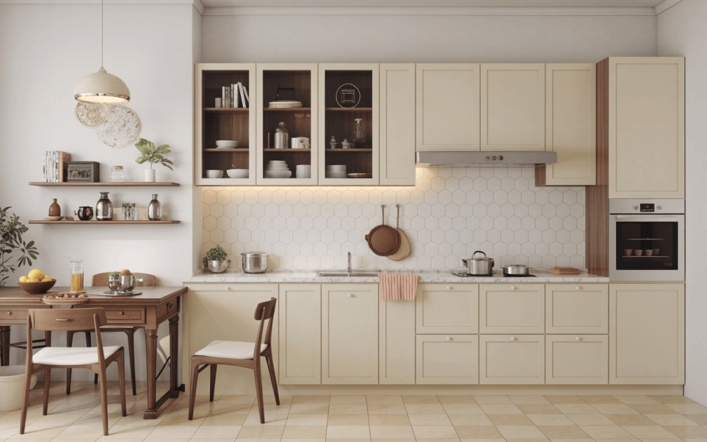 A cozy kitchen dining area featuring cream duco paint furniture and shaker cabinets.