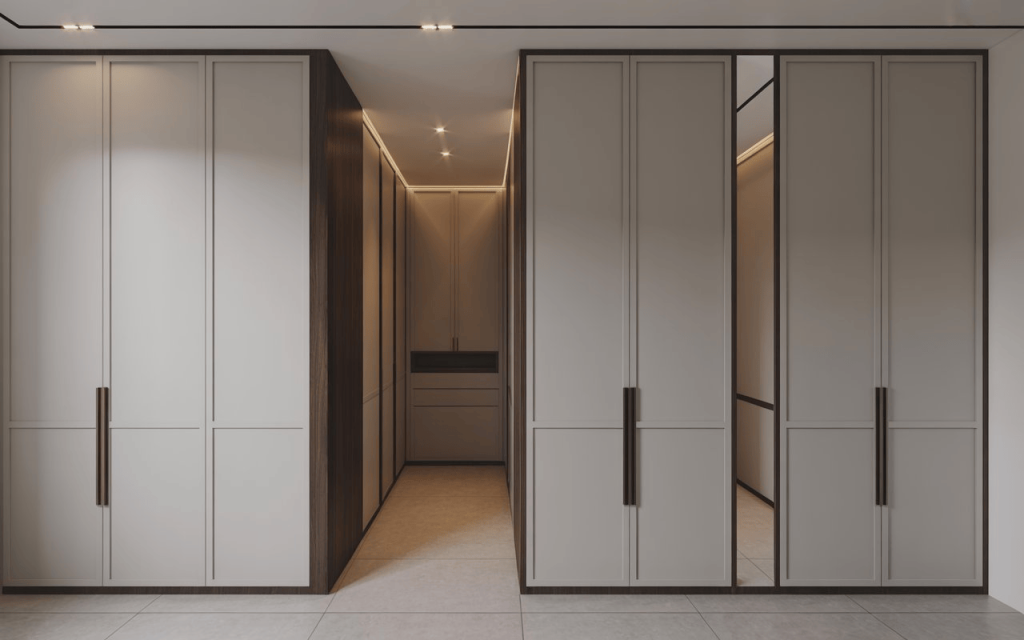 A spacious walk-in duco paint wardrobe with sleek beige panels and dark wood accents.