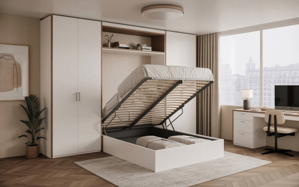 A white queen size bed with hydraulic storage open to show linens in a compact modern bedroom.